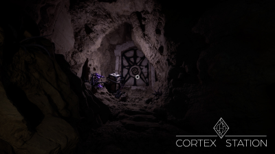 Screenshot from the vertical slice, depicting an alien door within the caves.